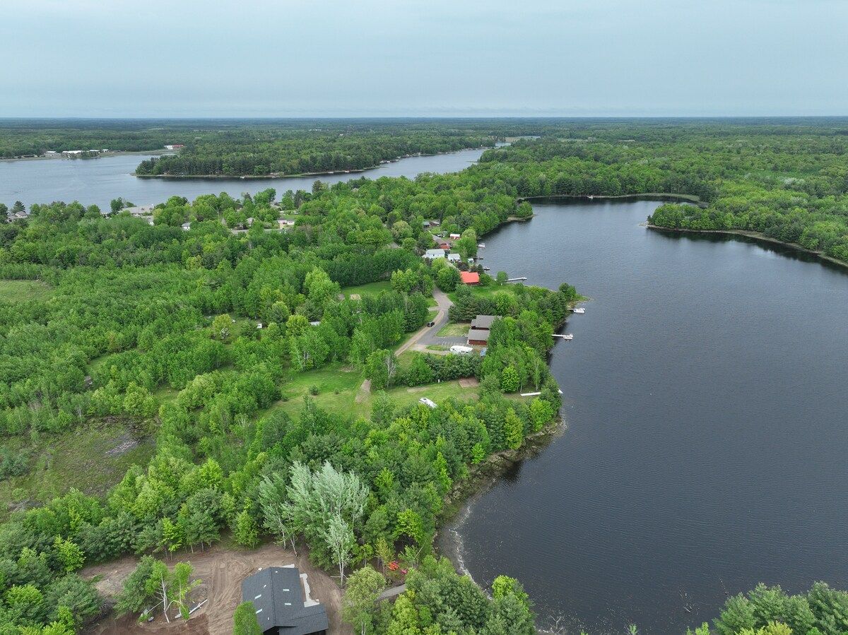 Aerial view of the private lake and surrounding woods near Siren, Wisconsin