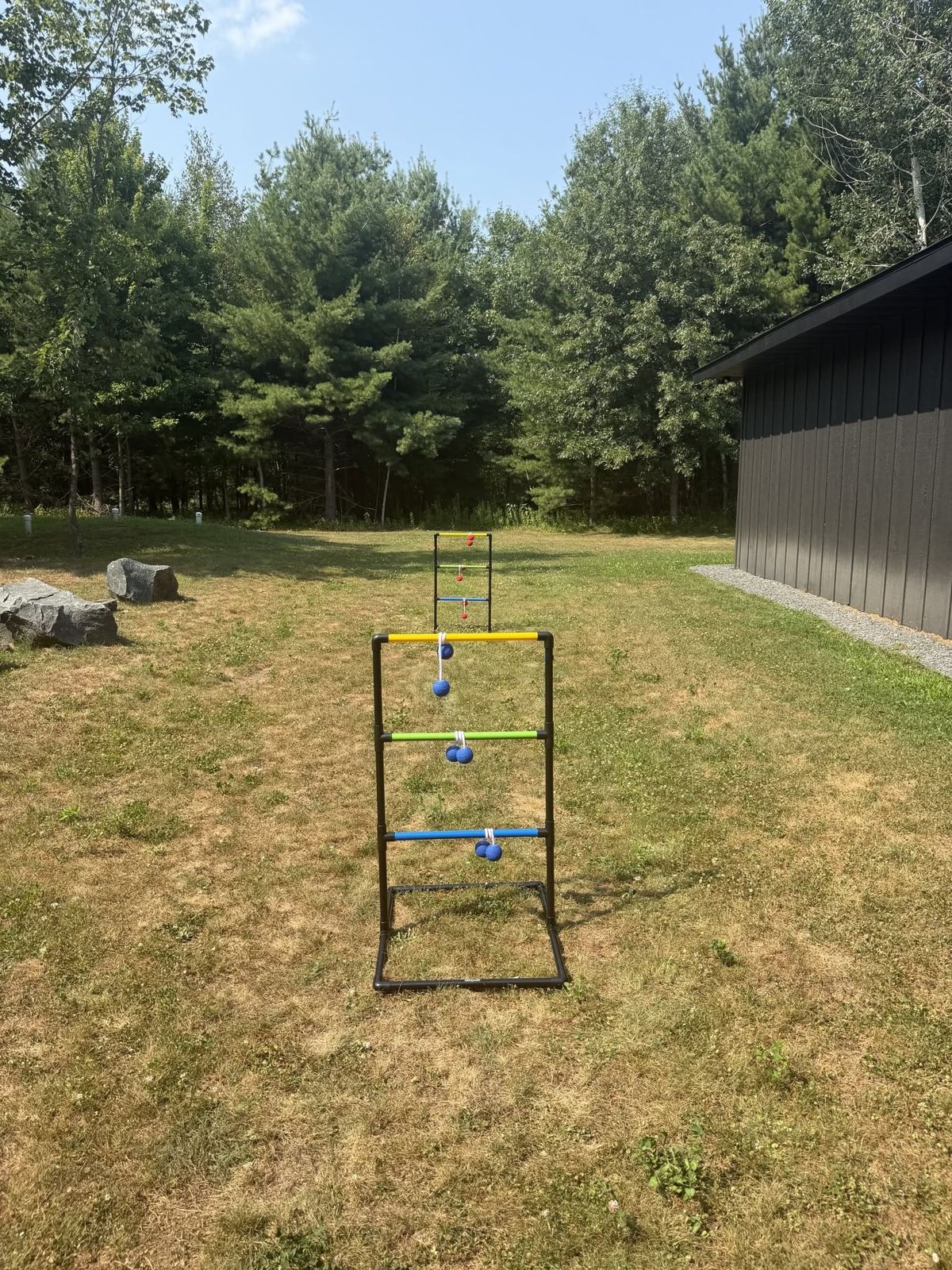 Ladder ball set up on the lawn at Cornerstone Cabin
