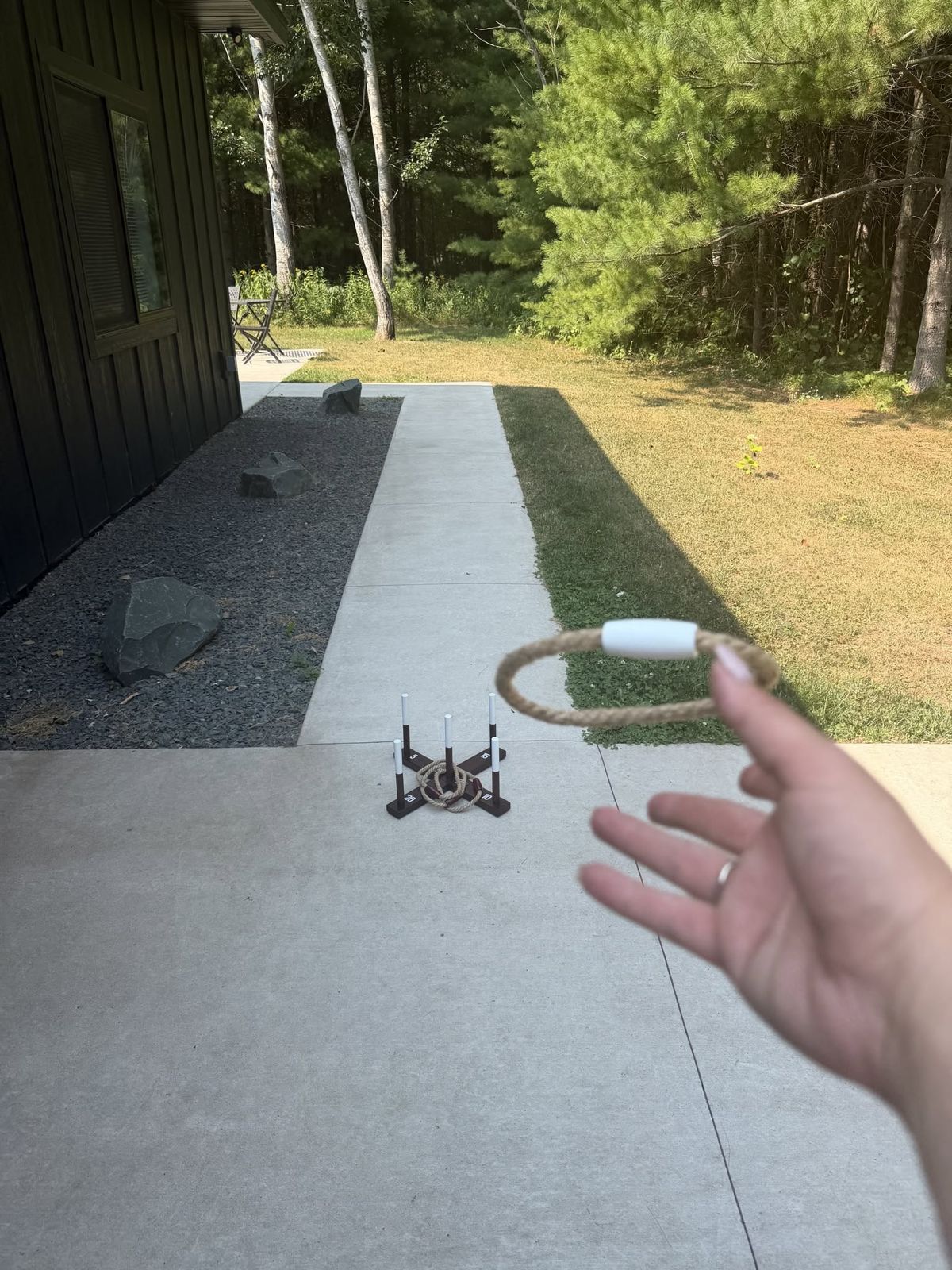 Ring toss game on the walkway at Cornerstone Cabin